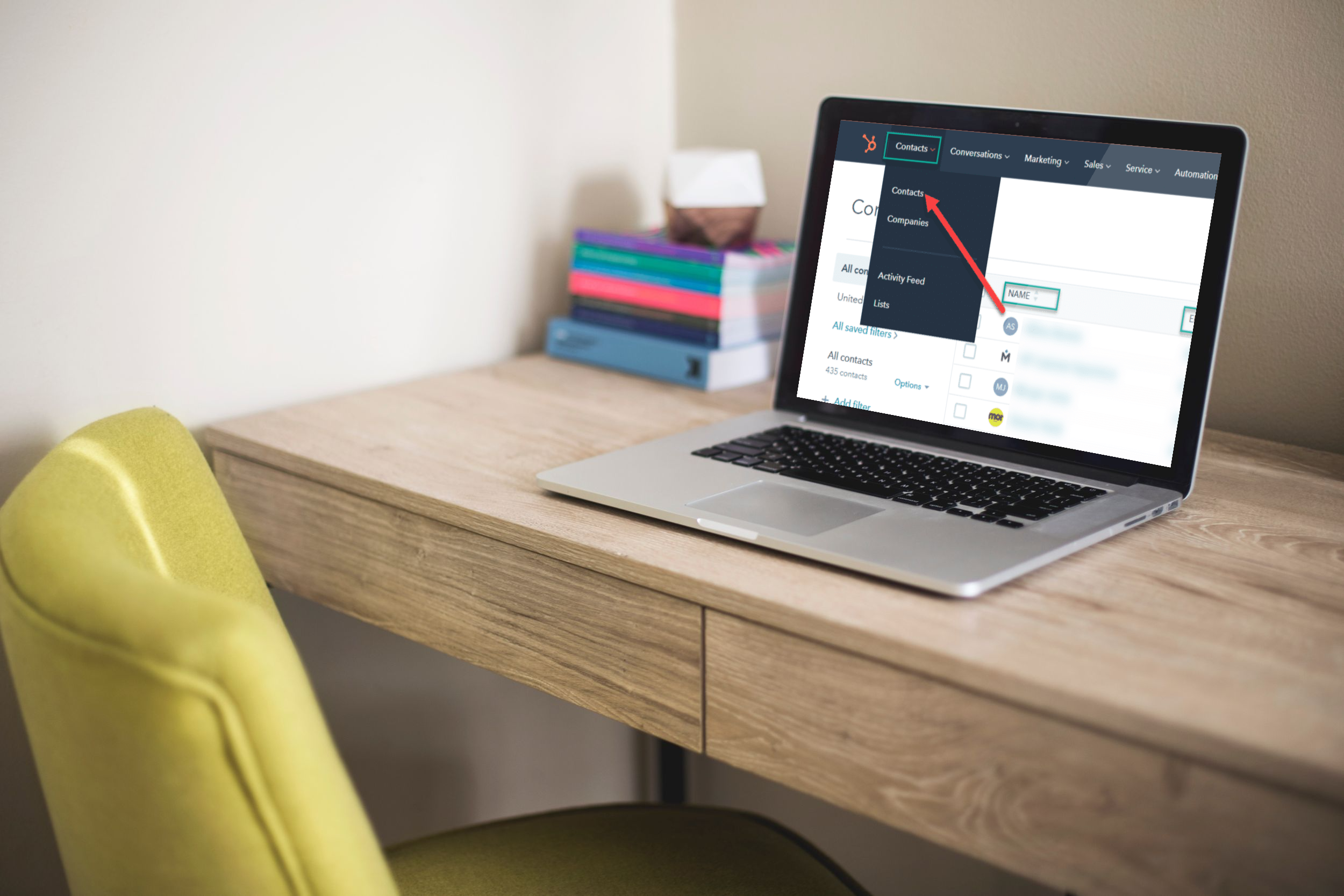 Laptop with HubSpot's Contact page shown